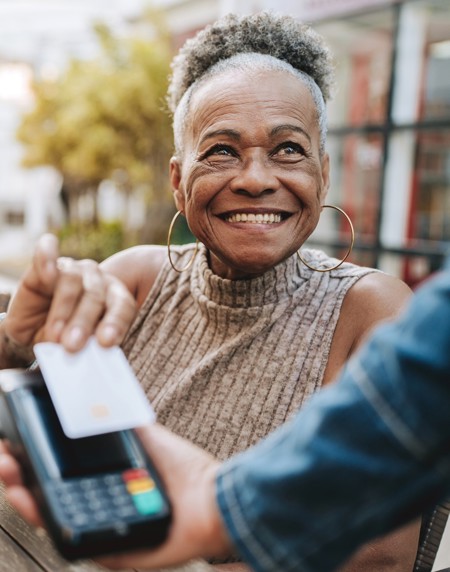 Istock 2229608915 Older People Paying With Card Cropped